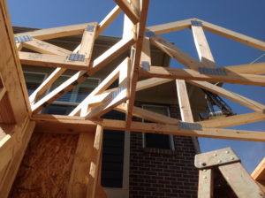 Kind of a complicated little roof line for a small addition, it required many custom trusses.