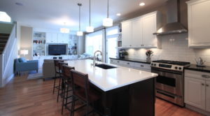 Kitchen and family room, now open to each other with removal of peninsula and one nice, long island.